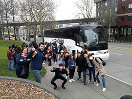 Our Motorcoach awaits our sightseeing group
